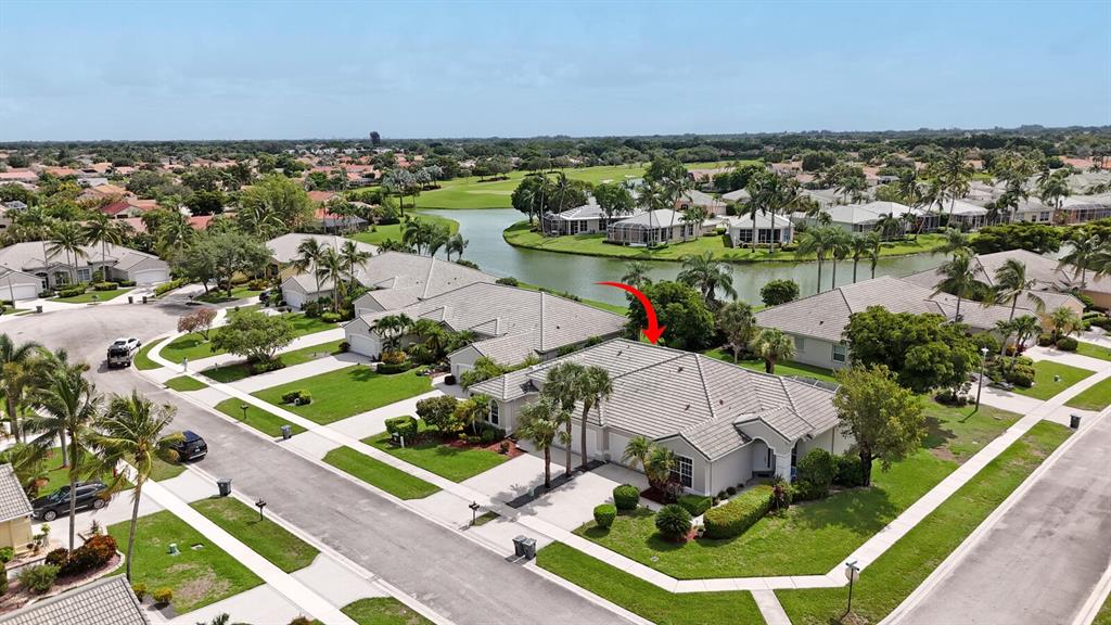 7955 Rockford Road Boynton Beach, FL 33472 - Photo 20 of 22 an aerial view of multiple house with outdoor space
