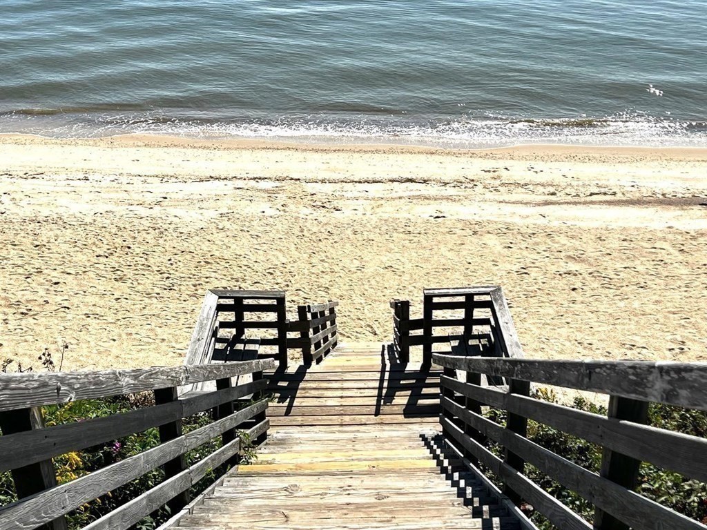 4 Race Point Road, Unit 4 Mashpee, MA 02649 - Photo 5 of 34 a view of ocean from a balcony