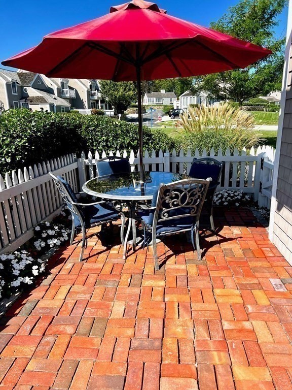 4 Race Point Road, Unit 4 Mashpee, MA 02649 - Photo 9 of 34 a outdoor view with a sitting space
