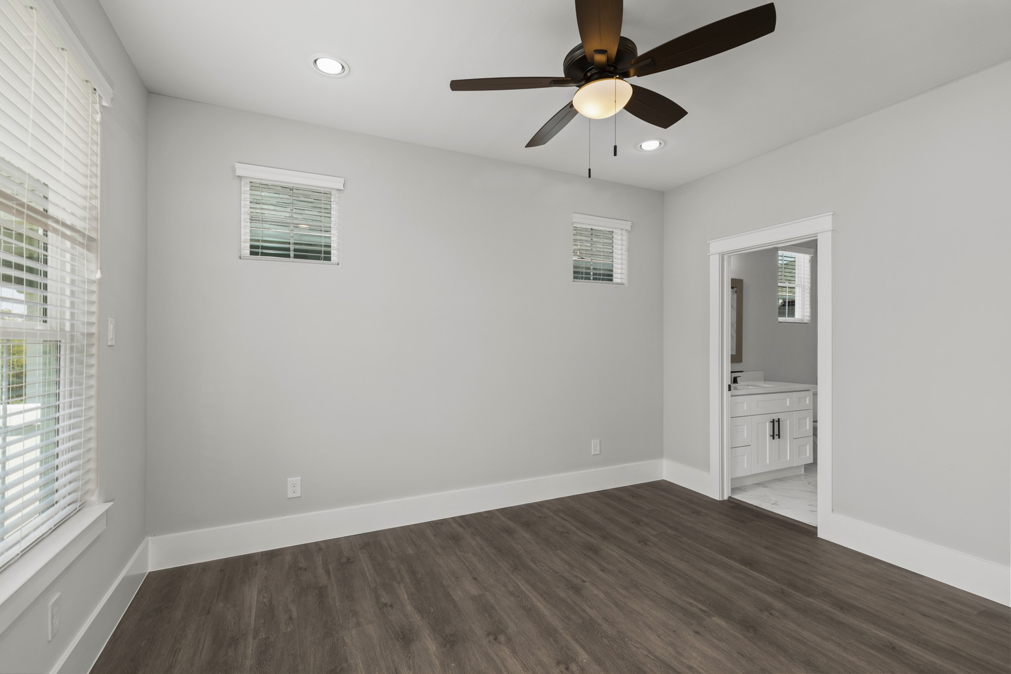 1421 West 23rd Street, Unit C Houston, TX 77008 - Photo 27 of 40 wooden floor in an empty room with a window