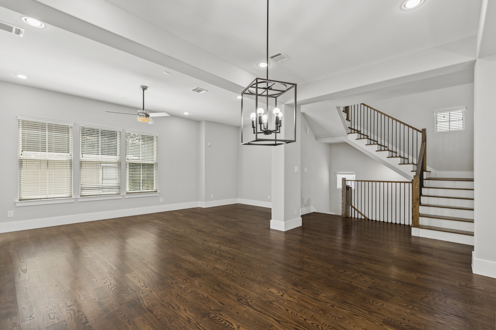 1421 West 23rd Street, Unit C Houston, TX 77008 - Photo 3 of 40 a view of empty room with wooden floor fireplace and entryway