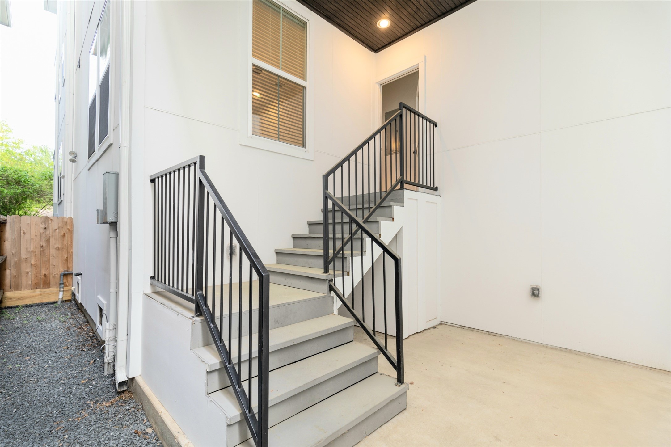 1421 West 23rd Street, Unit C Houston, TX 77008 - Photo 34 of 40 a view of staircase with railing and white walls