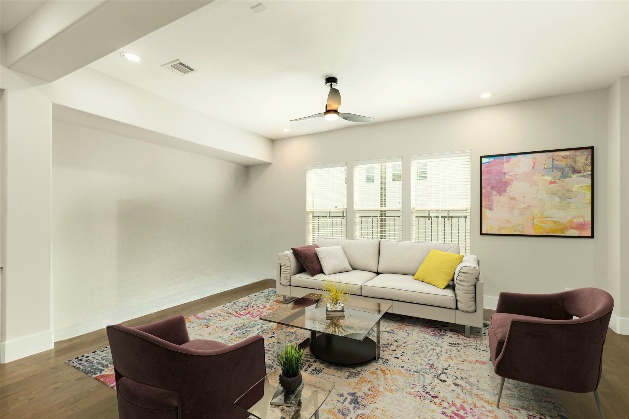 1421 West 23rd Street, Unit C Houston, TX 77008 - Photo 5 of 40 a living room with furniture and a window