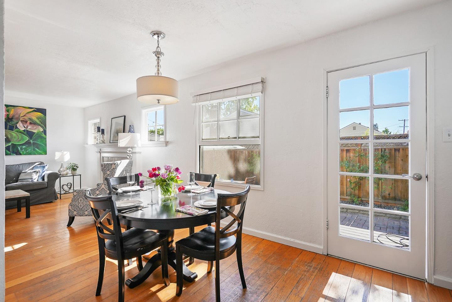 2250 Tulip Road San Jose, CA 95128 - Photo 13 of 39 a view of a dining room with furniture window and wooden floor