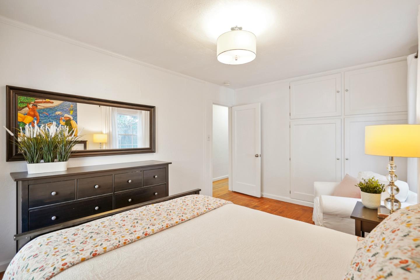 2250 Tulip Road San Jose, CA 95128 - Photo 16 of 39 a bedroom with a bed and a flat screen tv
