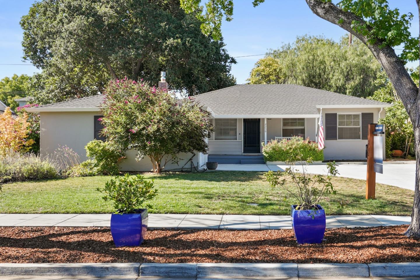 2250 Tulip Road San Jose, CA 95128 - Photo 2 of 39 a front view of a house with a yard patio and fire pit