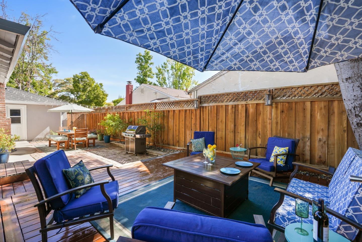 2250 Tulip Road San Jose, CA 95128 - Photo 25 of 39 a view of a patio with couches table and chairs and potted plants