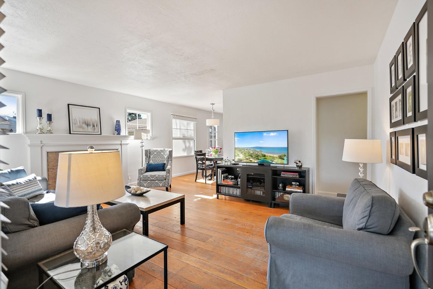 2250 Tulip Road San Jose, CA 95128 - Photo 3 of 39 a living room with furniture a rug and a lamp