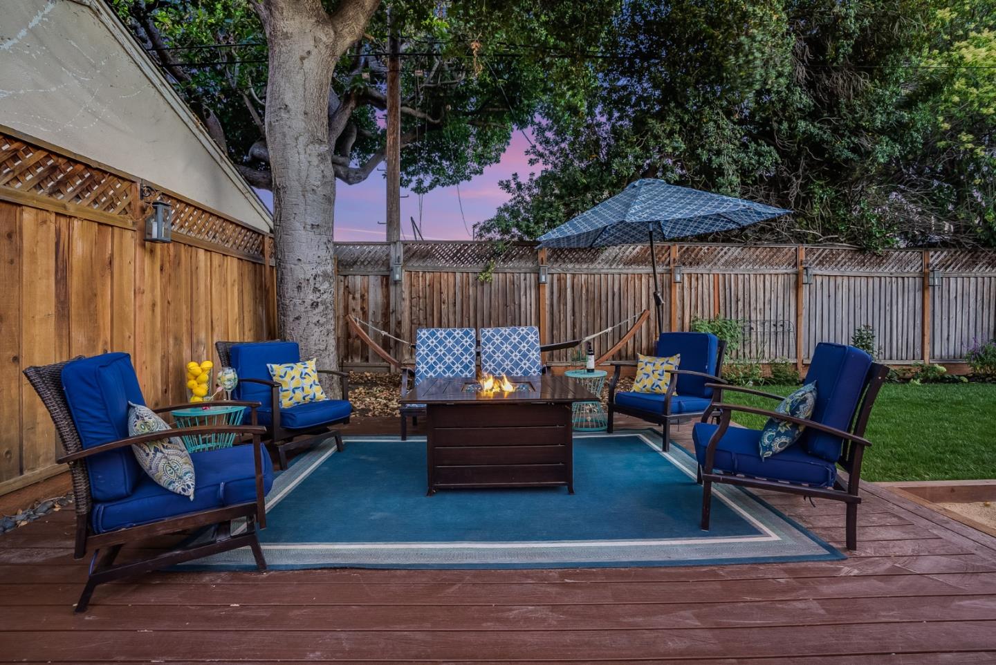 2250 Tulip Road San Jose, CA 95128 - Photo 33 of 39 an outdoor sitting area with furniture and wooden floor