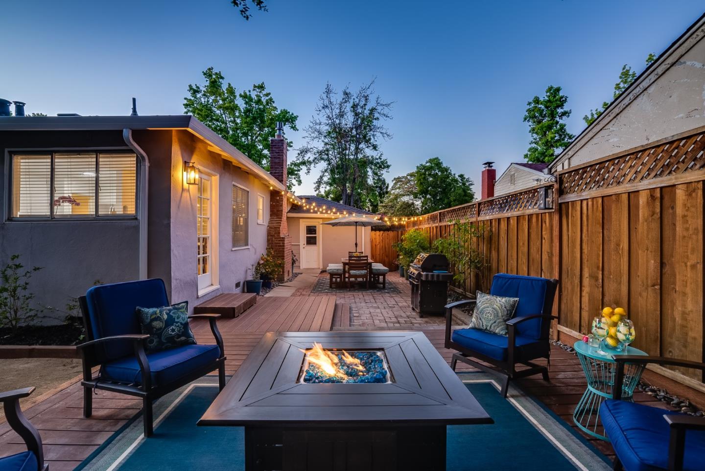 2250 Tulip Road San Jose, CA 95128 - Photo 36 of 39 a view of a chairs and tables in the back yard of the house