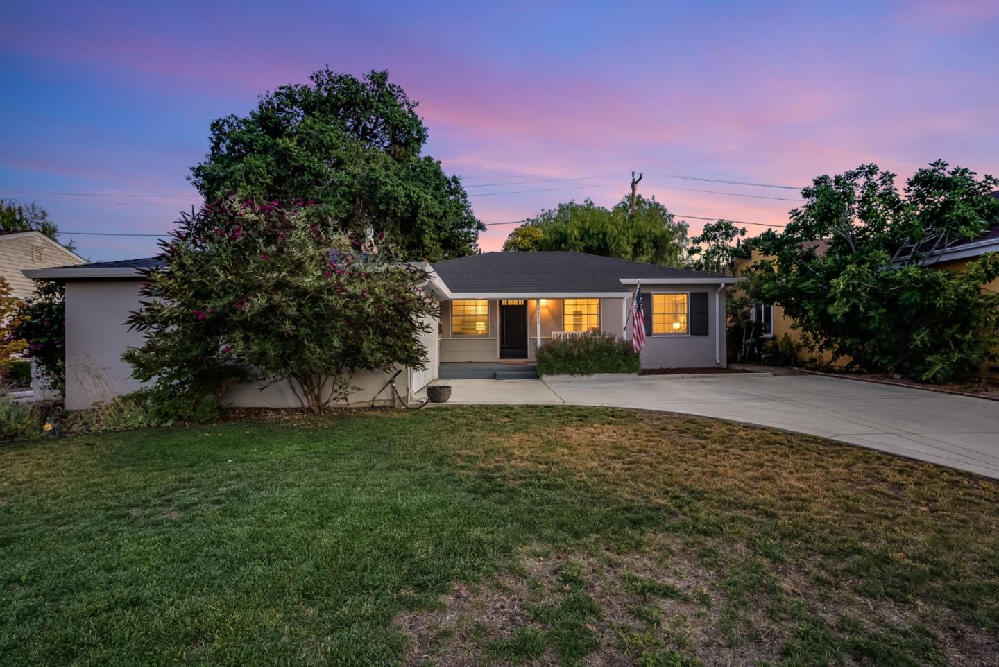 2250 Tulip Road San Jose, CA 95128 - Photo 39 of 39 a front view of a house with a garden and yard