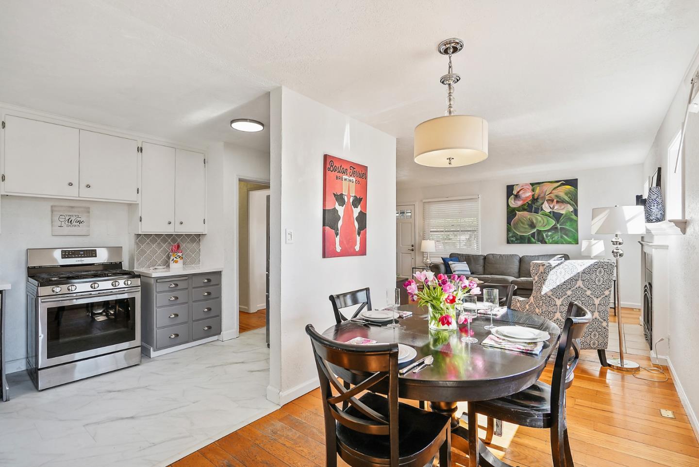 2250 Tulip Road San Jose, CA 95128 - Photo 9 of 39 a view of a dining room with furniture and wooden floor