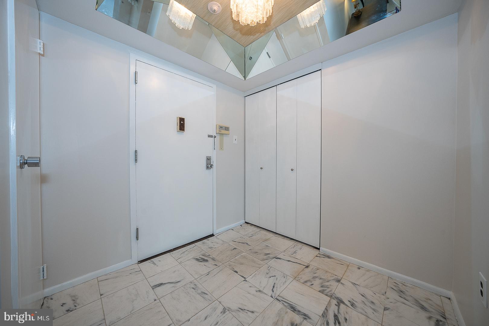 41 Conshohocken State Road, Unit 203 Bala Cynwyd, PA 19004 - Photo 2 of 34 Marble Entry Foyer with Multiple Closets