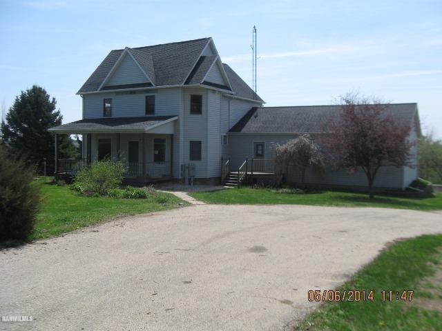 1471 West Becker School Road Freeport, IL 61032 - Photo 1 of 21 a front view of house with yard and green space