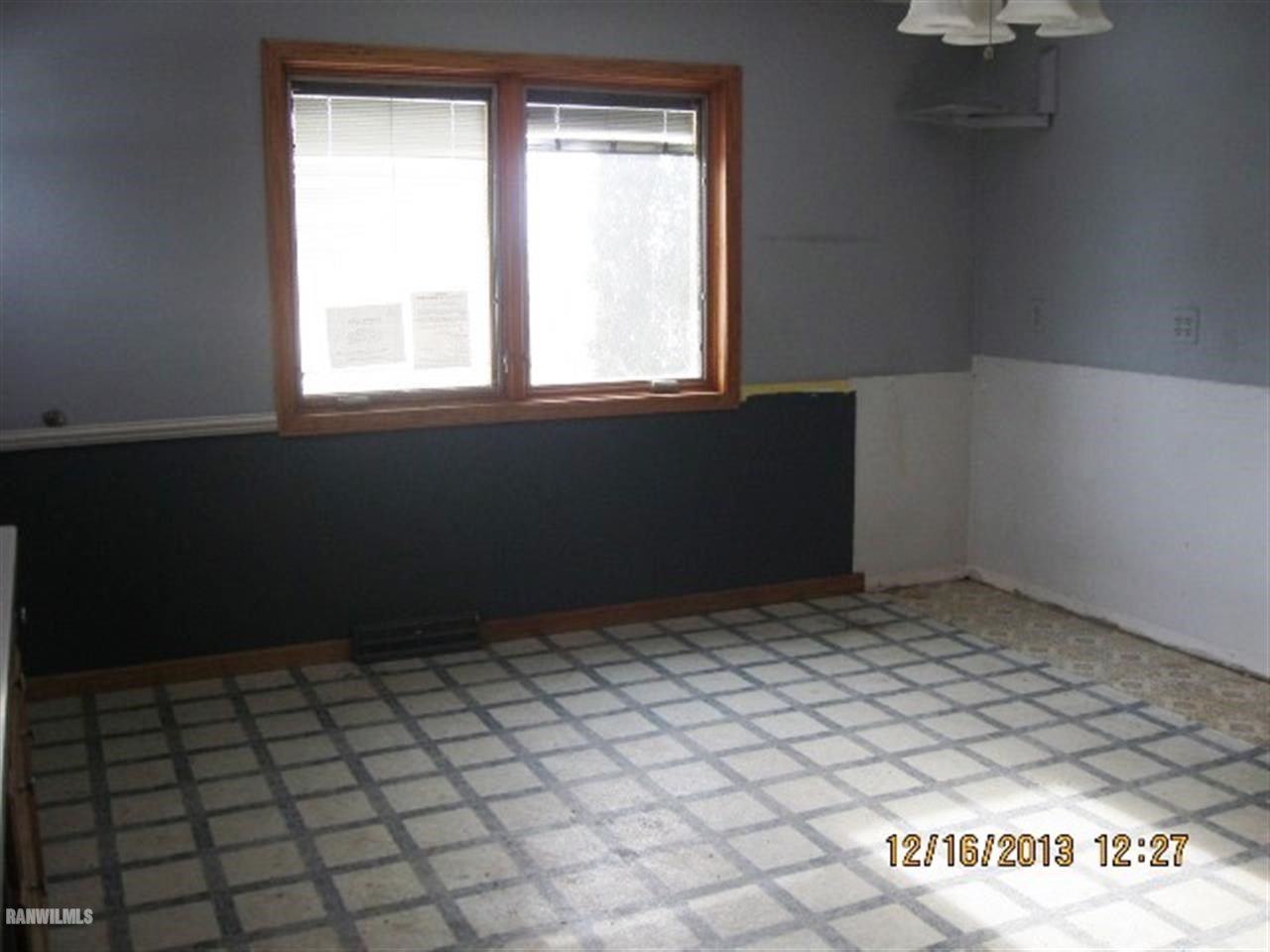 1471 West Becker School Road Freeport, IL 61032 - Photo 5 of 21 a view of an empty room and window