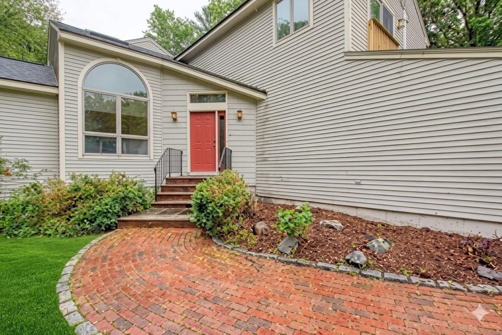 7 Tisdale Road Sharon, MA 02067 - Photo 2 of 37 a front view of a house with garden