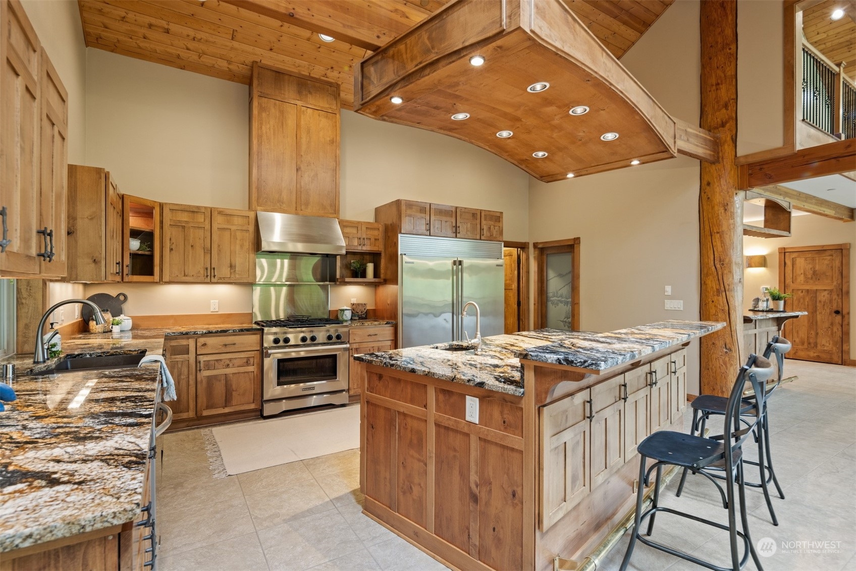 1815 High Noon Road Bellingham, WA 98226 - Photo 15 of 40 a kitchen that has a stove and a table