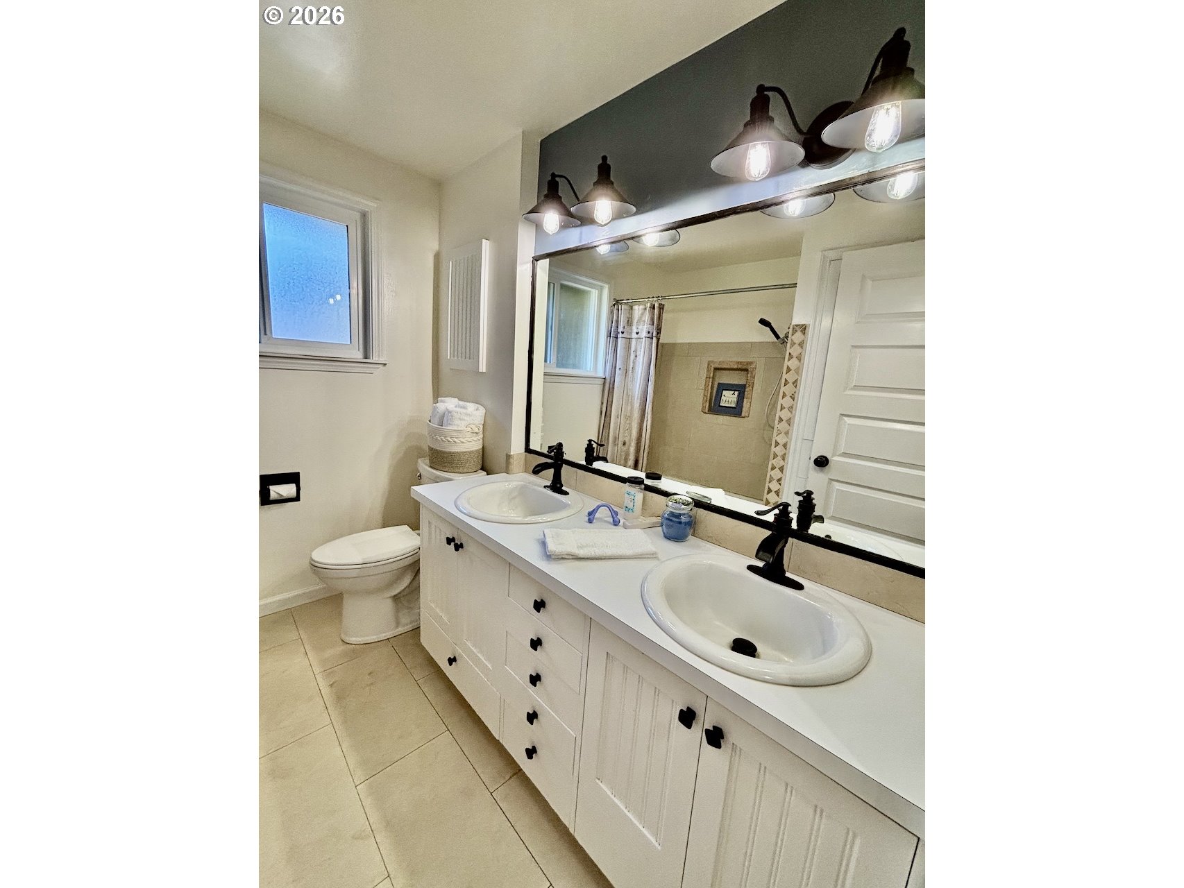 38684 Natures Garden Street Springfield, OR 97478 - Photo 14 of 26 a bathroom with a double vanity sink and a mirror