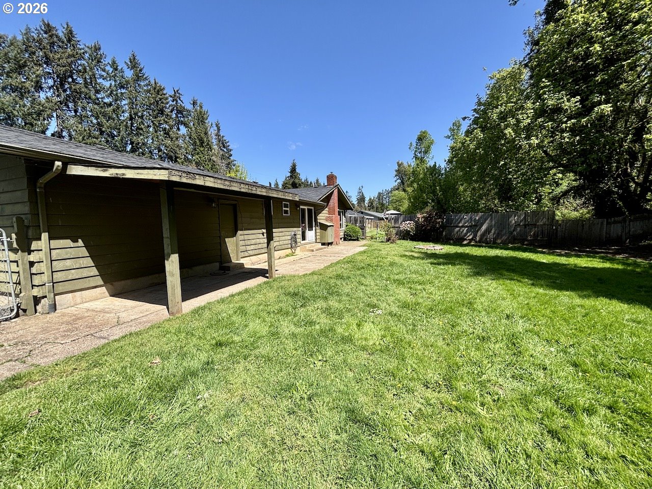 38684 Natures Garden Street Springfield, OR 97478 - Photo 22 of 26 a view of a backyard with a garden and entertaining space