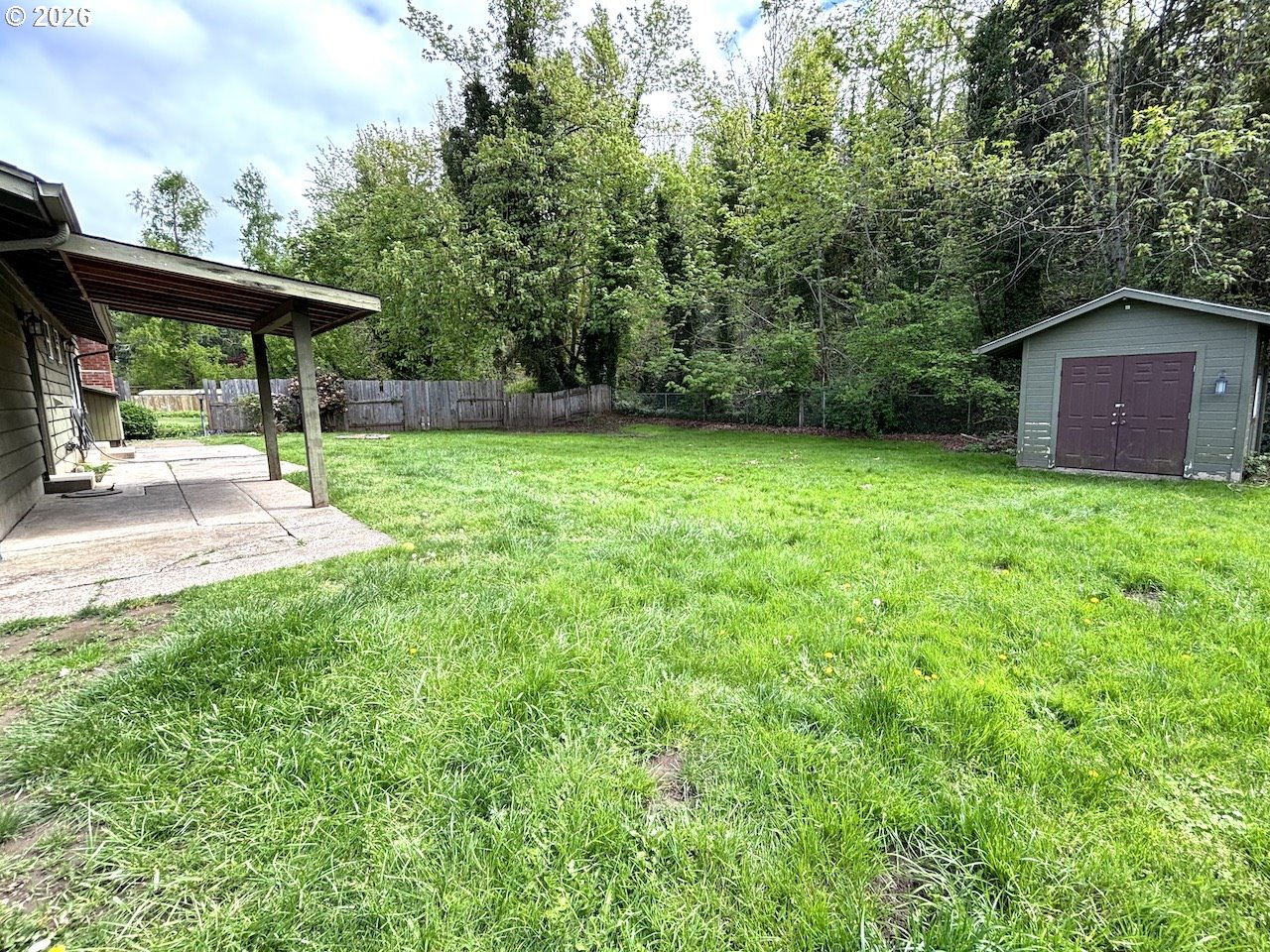 38684 Natures Garden Street Springfield, OR 97478 - Photo 24 of 26 a view of backyard with a barn and large trees
