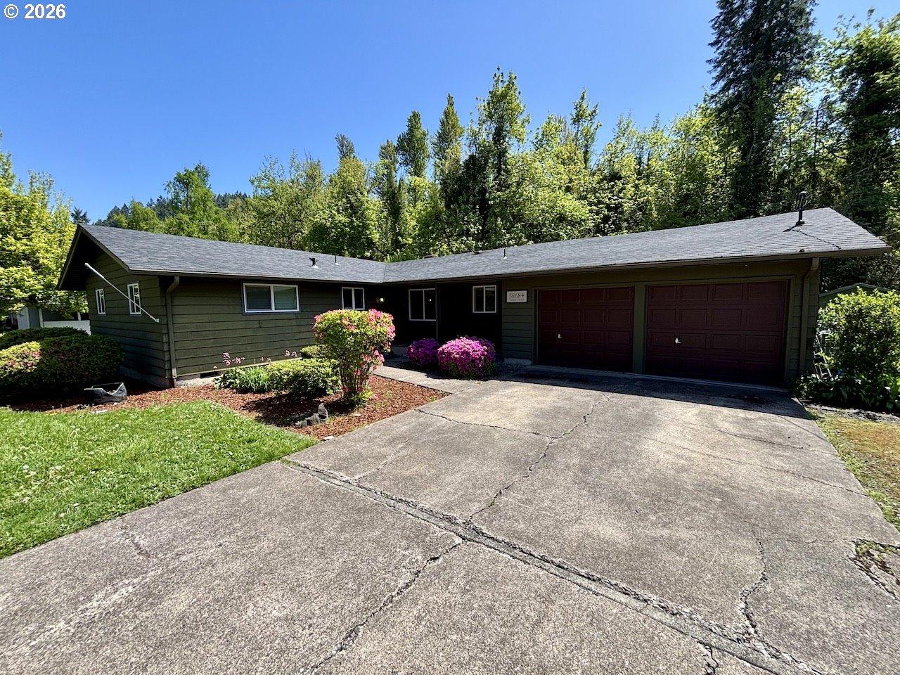 38684 Natures Garden Street Springfield, OR 97478 - Photo 3 of 26 a front view of a house with garden