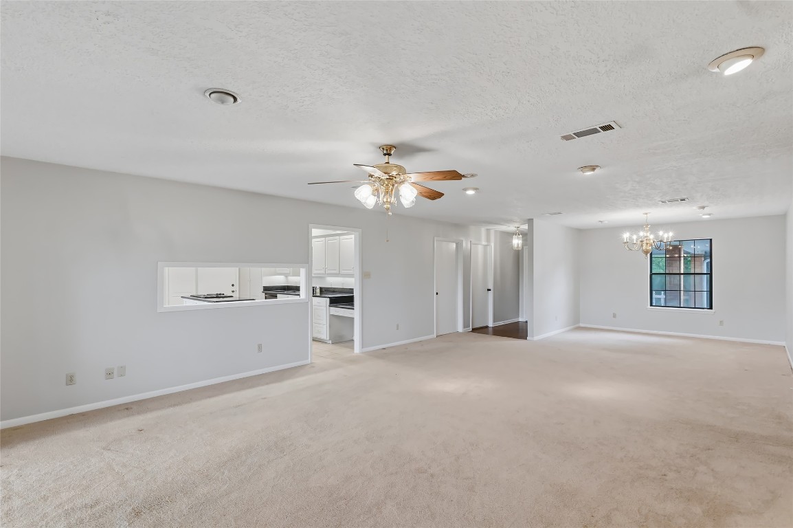 807 Standley Road Madisonville, TX 77864 - Photo 11 of 35 a view of a livingroom with a ceiling fan and window