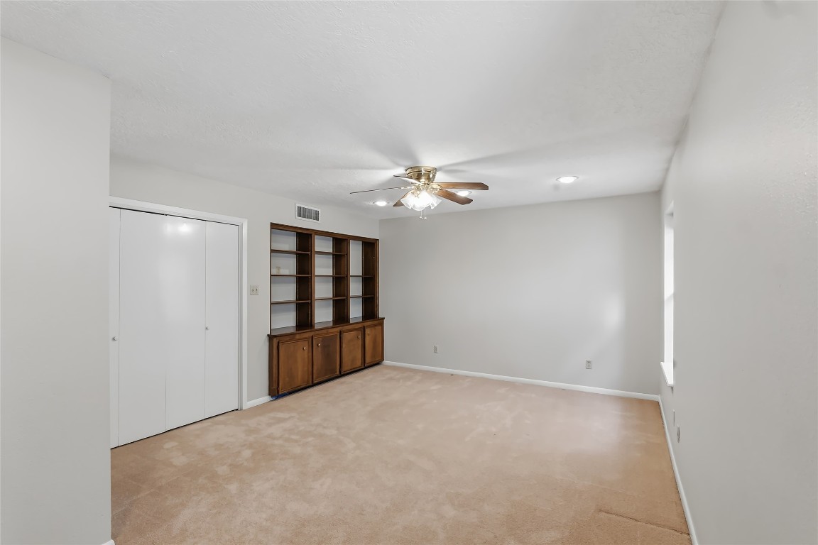 807 Standley Road Madisonville, TX 77864 - Photo 23 of 35 a view of an empty room with a window