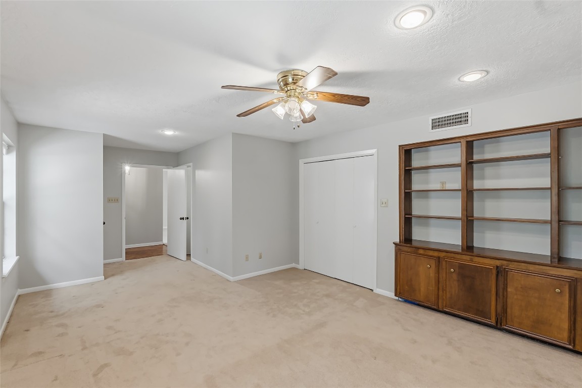807 Standley Road Madisonville, TX 77864 - Photo 24 of 35 a view of an empty room with a window