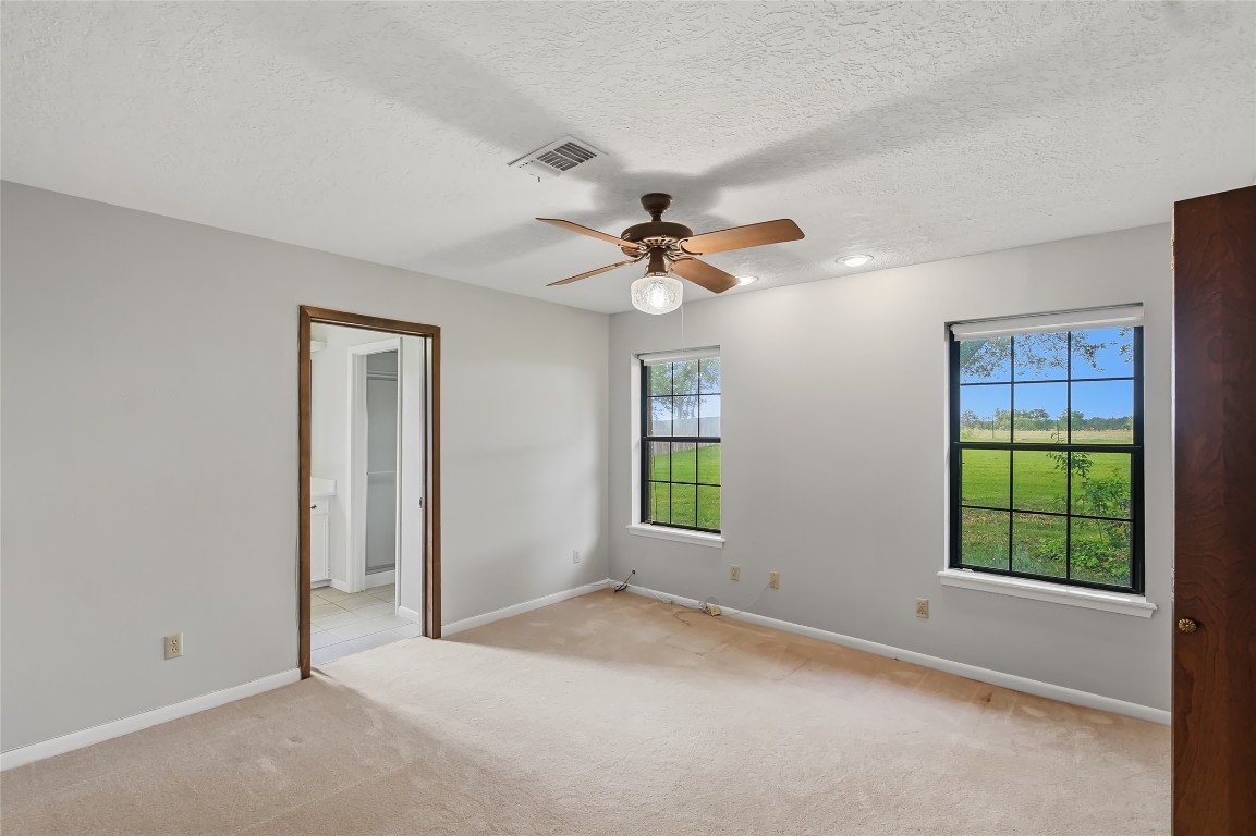 807 Standley Road Madisonville, TX 77864 - Photo 26 of 35 a view of an empty room with a window