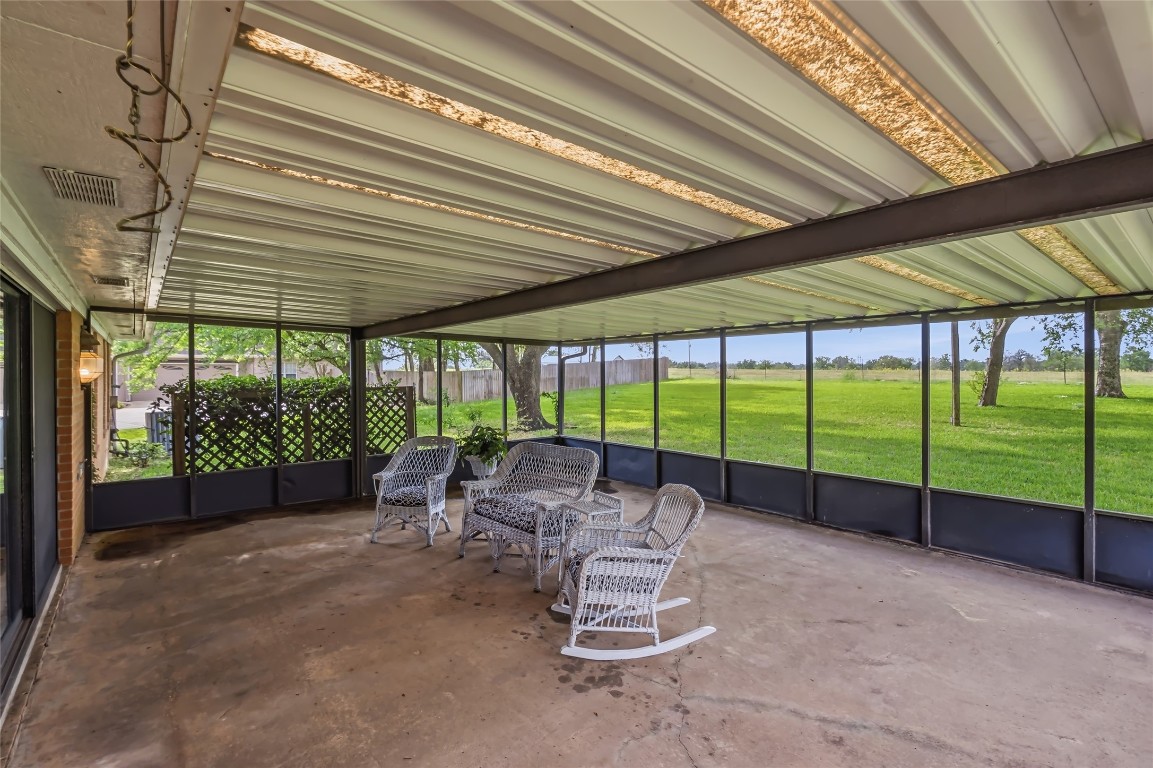 807 Standley Road Madisonville, TX 77864 - Photo 31 of 35 a room with pool table and chairs