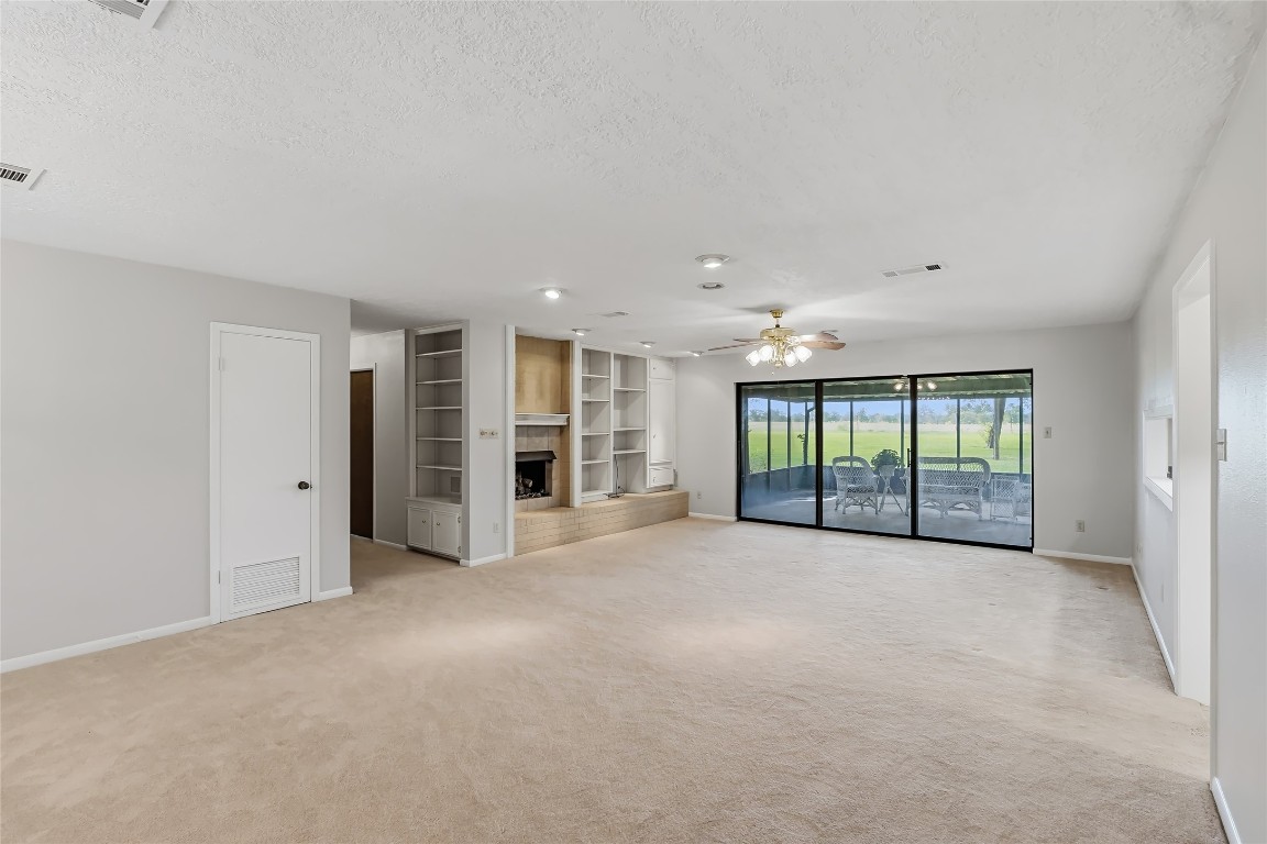 807 Standley Road Madisonville, TX 77864 - Photo 6 of 35 a view of an empty room with a window