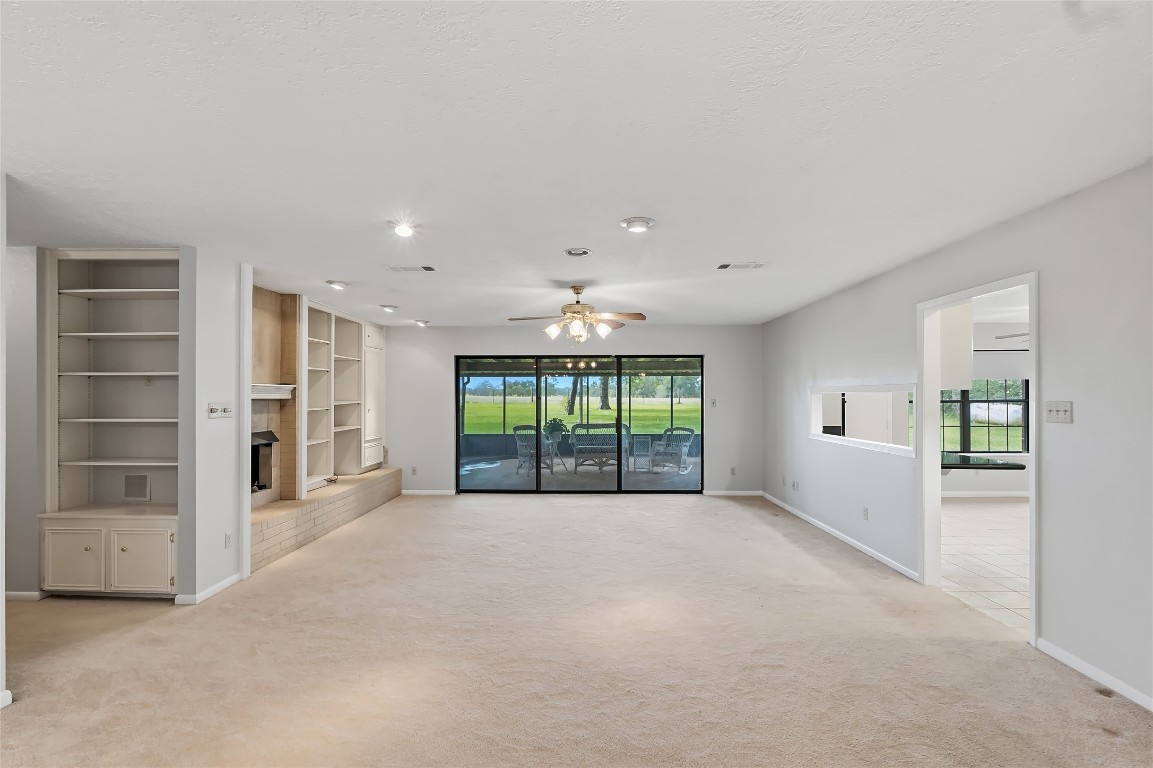 807 Standley Road Madisonville, TX 77864 - Photo 7 of 35 a view of a big room with windows and closet