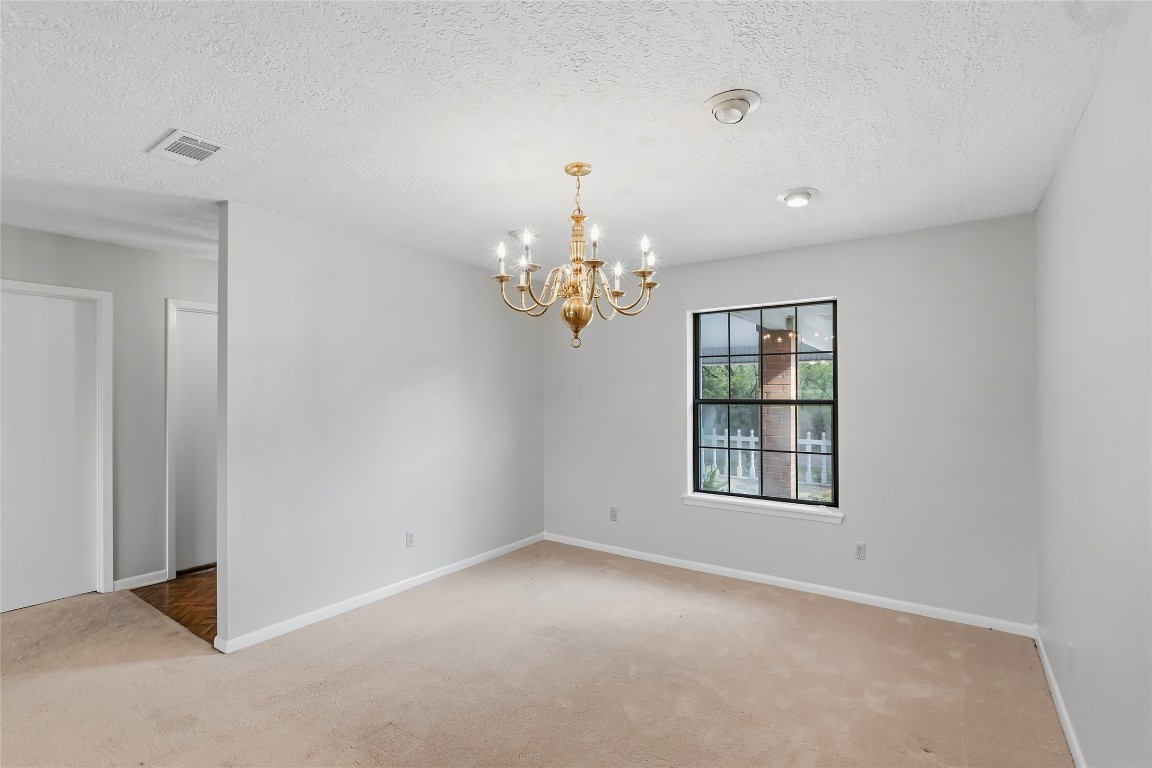 807 Standley Road Madisonville, TX 77864 - Photo 9 of 35 a view of an empty room with a window