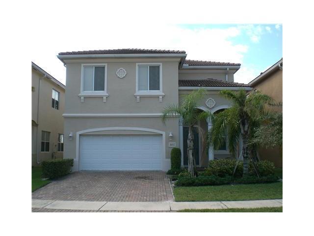 511 Gazetta Way West Palm Beach, FL 33413 - Photo 1 of 26 Front of home