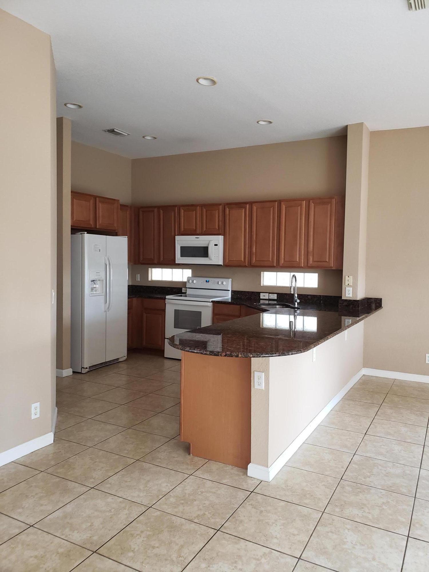 511 Gazetta Way West Palm Beach, FL 33413 - Photo 2 of 26 20200212_160858
