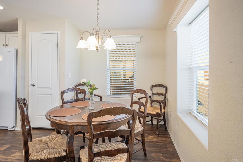 4650 Dulin Road, Unit 40 Fallbrook, CA 92003 - Photo 13 of 52 a view of a dining room with furniture and window