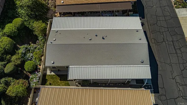 a view of a patio with wooden floor