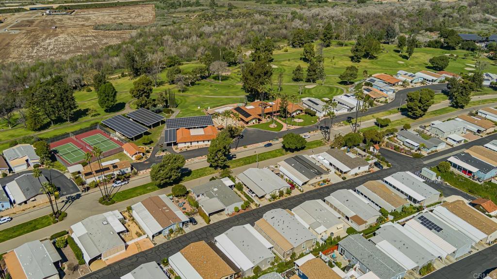 4650 Dulin Road, Unit 40 Fallbrook, CA 92003 - Photo 26 of 52 an aerial view of a city with lots of residential buildings