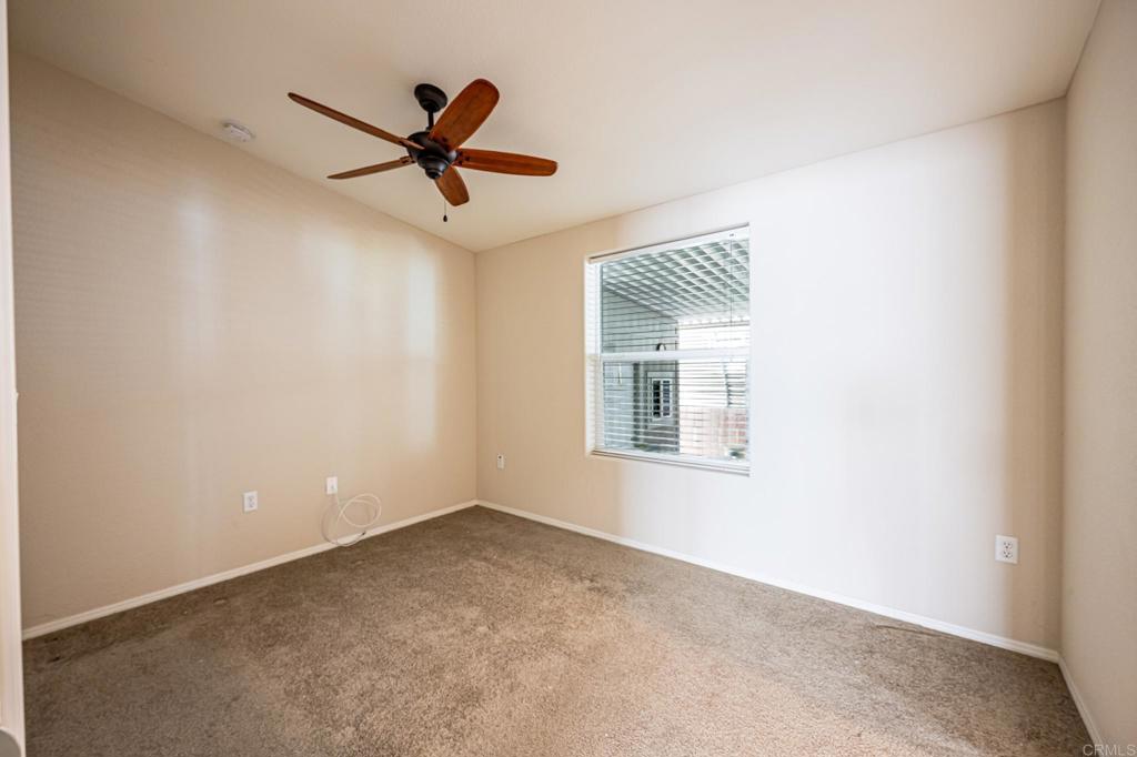 4650 Dulin Road, Unit 40 Fallbrook, CA 92003 - Photo 27 of 52 a view of empty room with ceiling fan