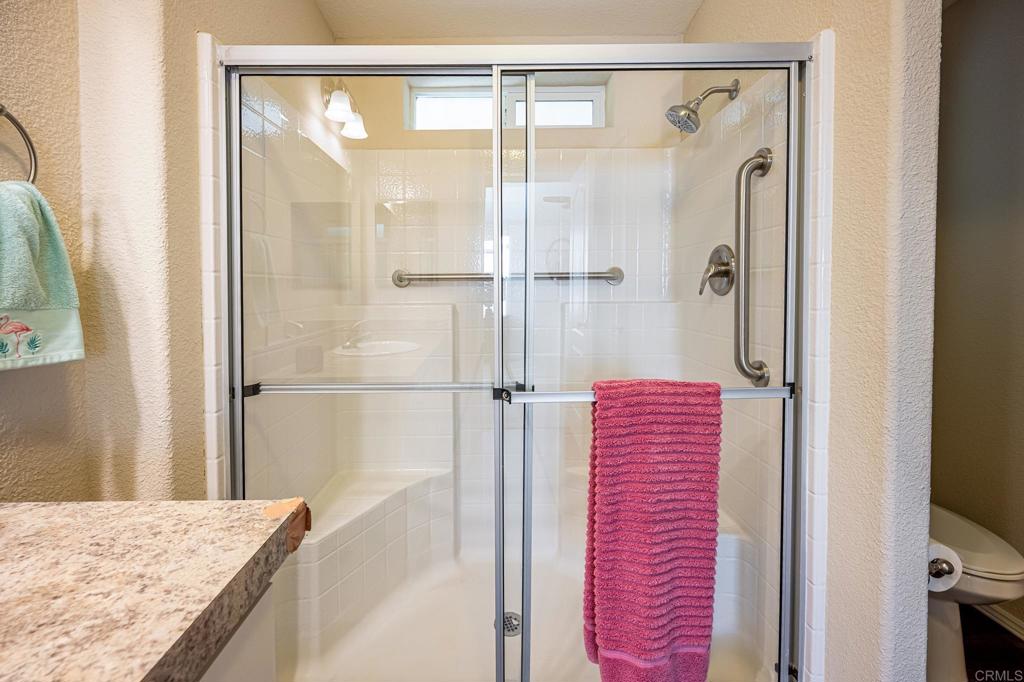 4650 Dulin Road, Unit 40 Fallbrook, CA 92003 - Photo 30 of 52 a bathroom with a shower and a bath tub