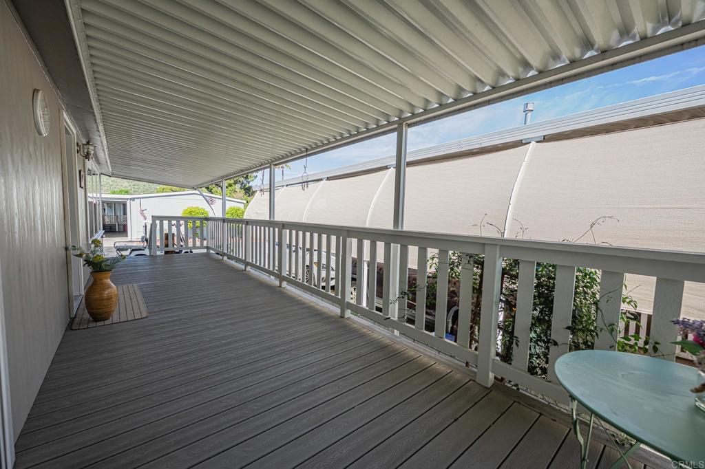 4650 Dulin Road, Unit 40 Fallbrook, CA 92003 - Photo 36 of 52 a view of a patio with wooden floor
