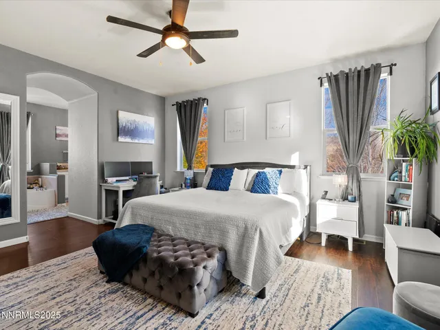 a bathroom with a bathtub a sink and a window