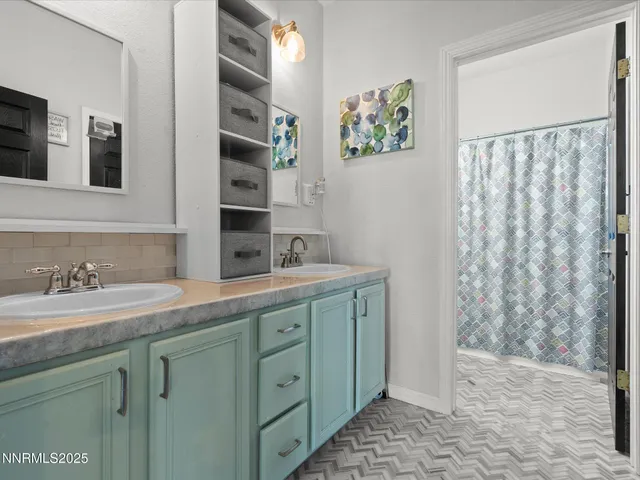 a view of yard with tree and a wooden fence