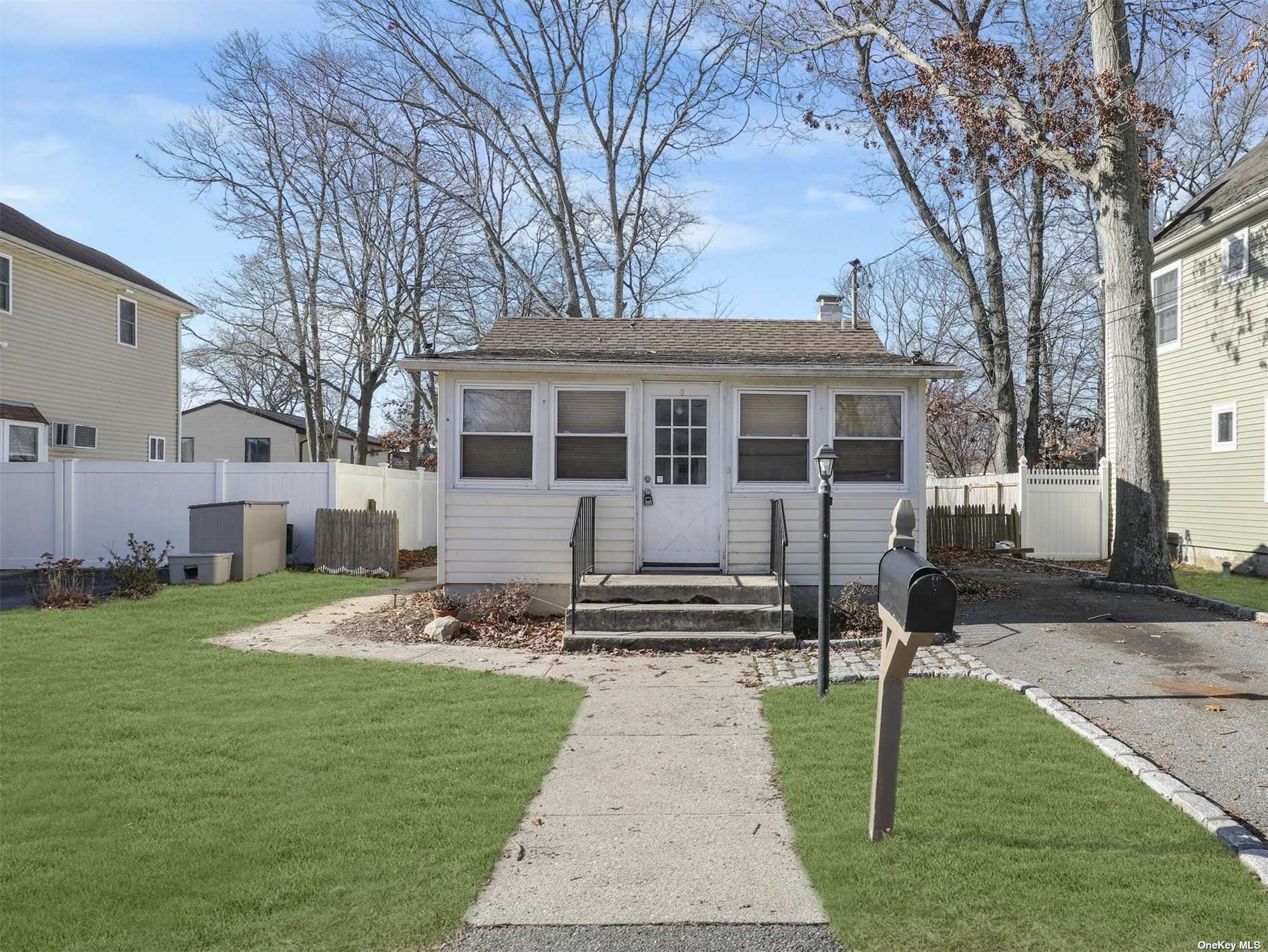 a house view with a garden space