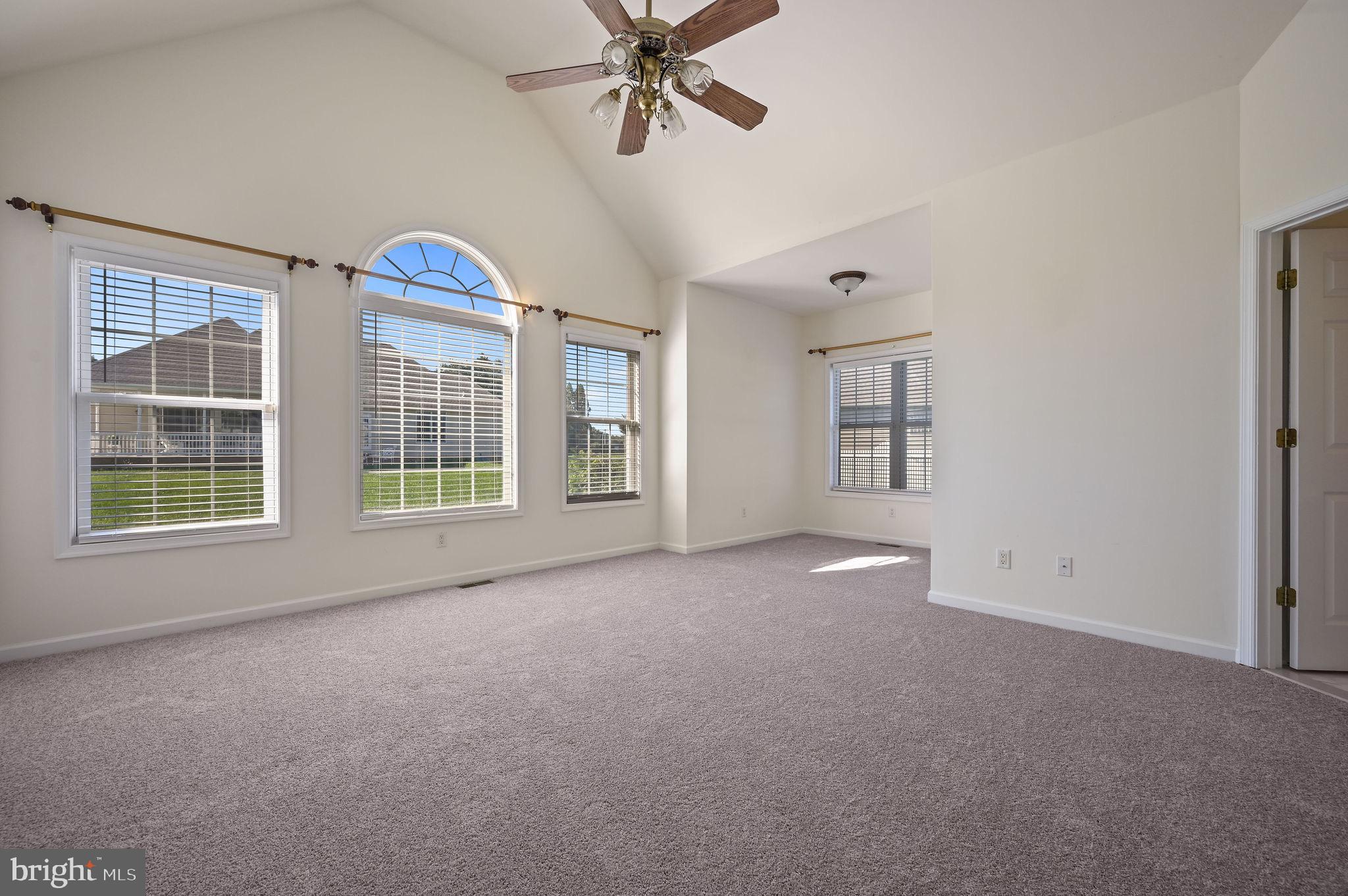 85 Redcrest Court Dover, DE 19904 - Photo 11 of 20 wooden floor and windows in a room