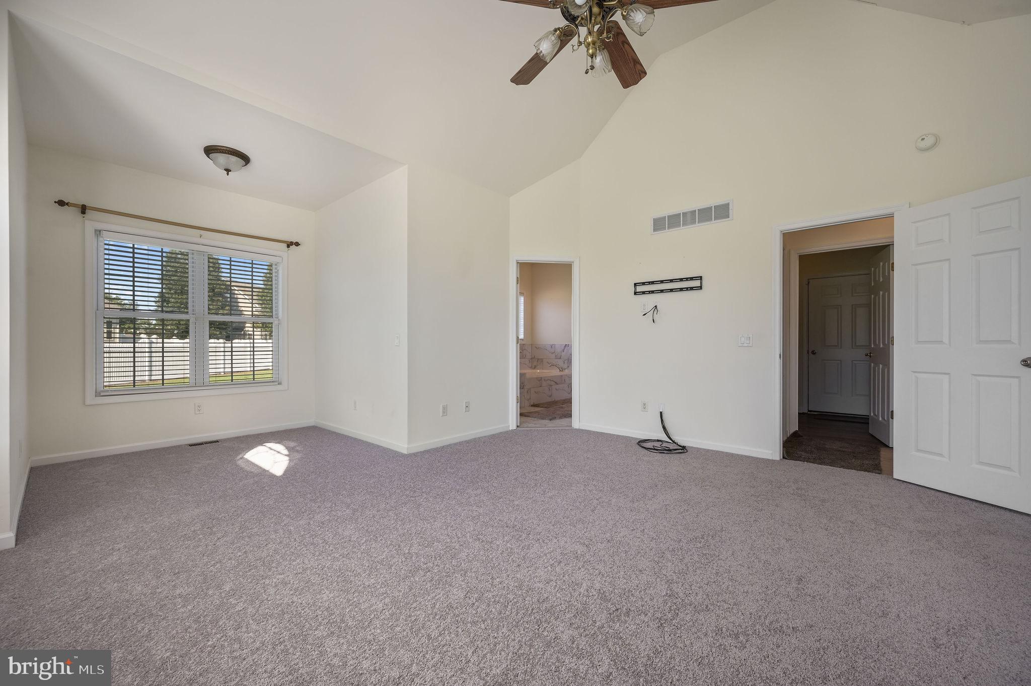 85 Redcrest Court Dover, DE 19904 - Photo 12 of 20 a view of empty room with windows