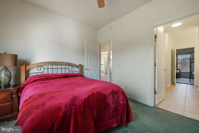 a bedroom with a bed and closet