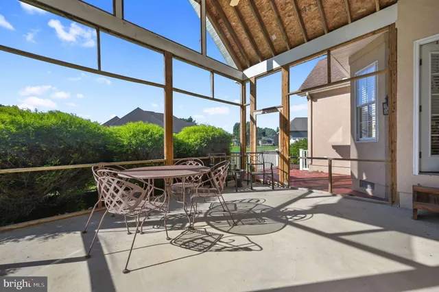 a view of an outdoor dining space with furniture