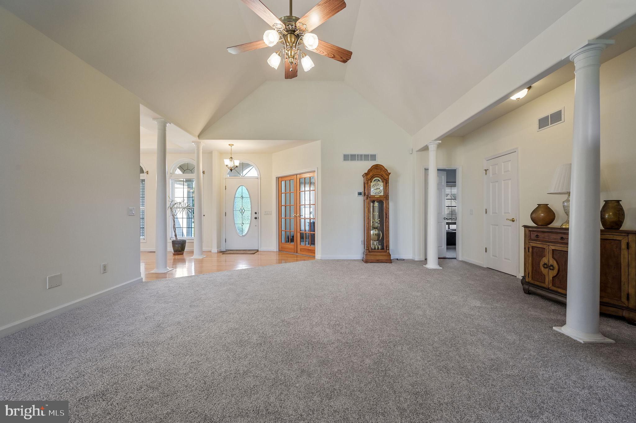85 Redcrest Court Dover, DE 19904 - Photo 4 of 20 an empty room with closet and a chandelier fan