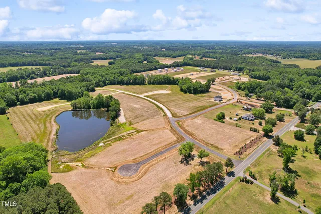 an aerial view of a house with a outdoor space